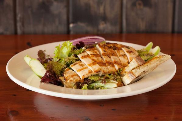 Healthy salad with bread and chicken